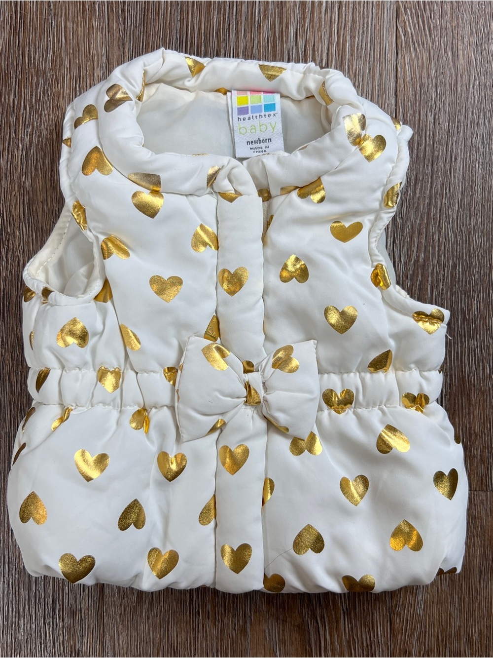 Healthtex Baby Puffer Vest Ivory Gold Heart Print Bow Front | Newborn